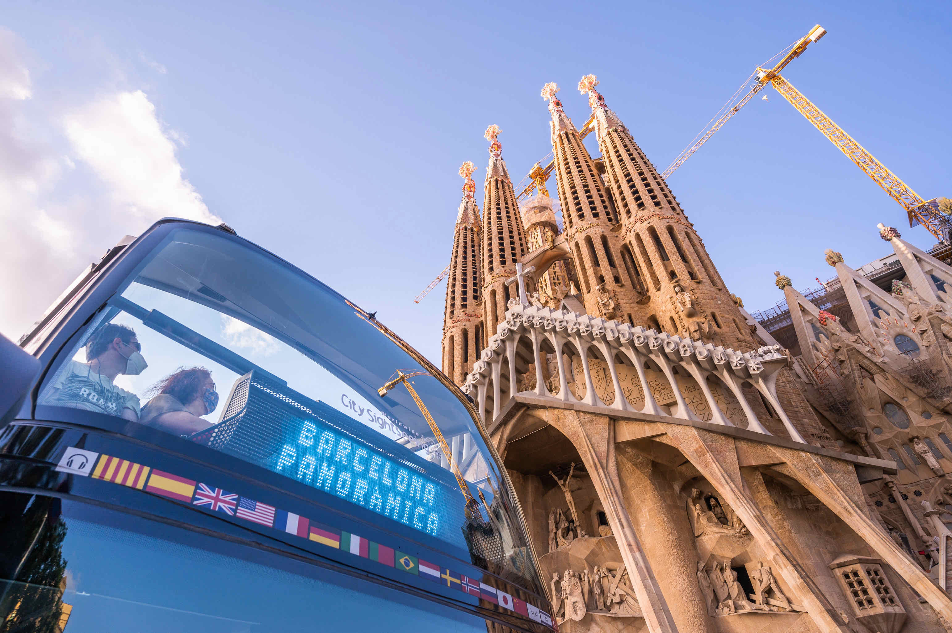 Blue Barcelona Bus Turístic bus parked in front of Sagrada Família